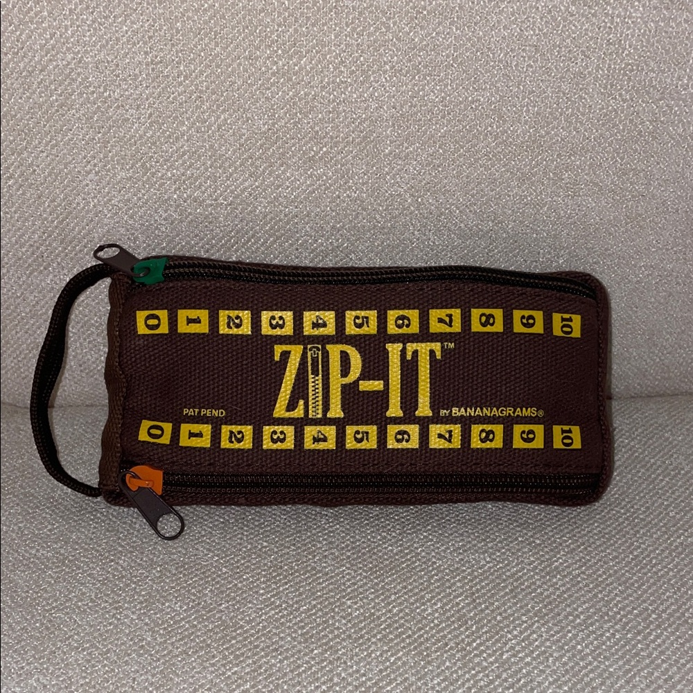 Banana Republic Brown Zip-It Word Game